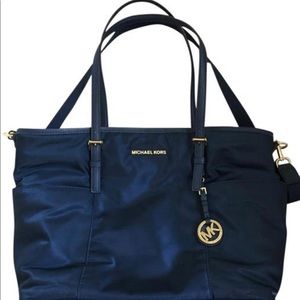 Michael Kors Diaper bag.